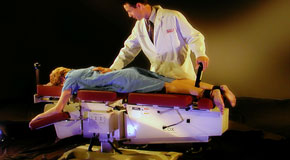 This is a picture of Cox Technic chiropratic spinal manipulation as performed at Young Chiropractic.